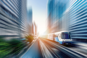 Wall Mural - BTS sky train in Bangkok Thailand with motion blur effect