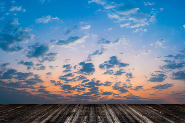 Poster - Empty old wood floor with blue sky background.