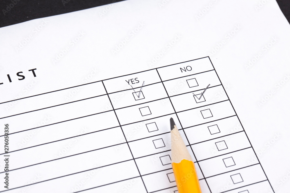 Checklist box with red checkmark, paper and a pen with checklist ...