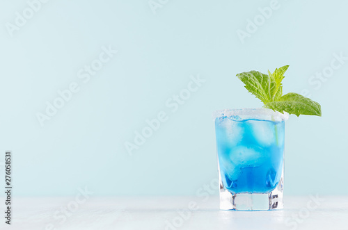 Blue Curacao Cocktail With Ice Cubes Green Mint Sugar Rim