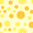 © ArtParnyuk - Vector seamless pattern with fruit slices. Oranges and lemons on a yellow polka dot background