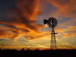 © Stockphotoman - Kansas Windmill at Sunset with colorful clouds.