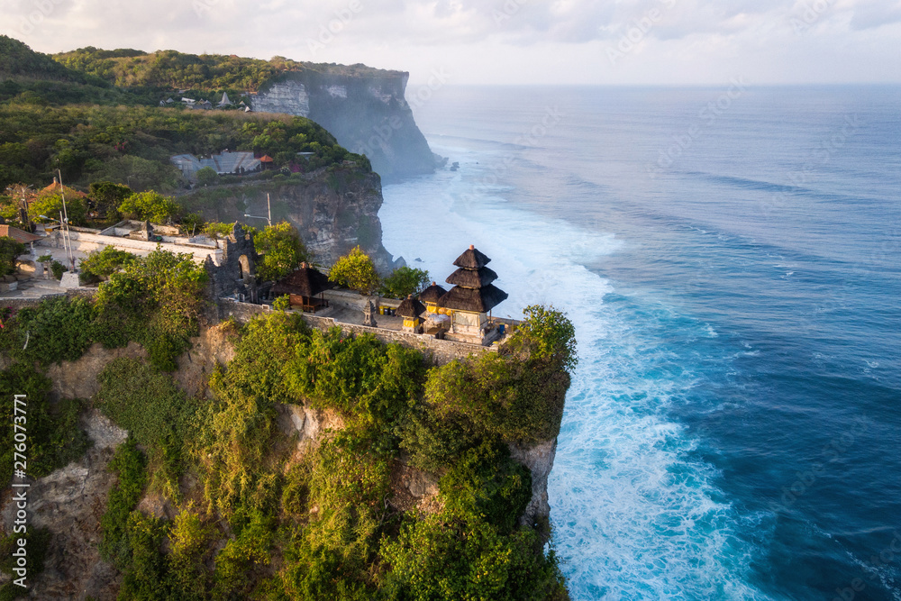 Bali, Indonesia, Aerial View of Uluwatu Temple at Sunrise - obrazy, fototapety, plakaty 