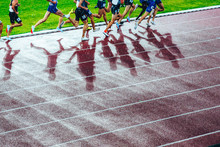 Female Track And Field Race At Athletics Stadium. Professional Female Runners. Photo For Athletics Competition At Summer Olympic Game Tokyo 2020.