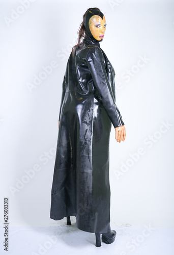 Plus size woman in latex suit and leather boots in thick heavy rubber  raincoat on white background in Studio. hot fashionable adult girl posing  in fetish clothes alone isolated hot - Buy