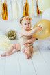 © kaloriya - Little happy toddler girl celebrating first birthday