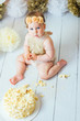 © kaloriya - Little baby girl eating cake on her first birthday cakesmash party
