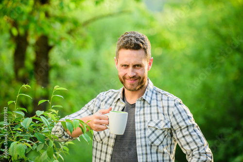 happy man with cup of tea. morning coffee. healthy lifestyle. nature and  health. breakfast refreshment time. ecological life for man. man in green  forest. drink tea outdoor. What a great morning -