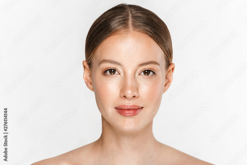 Beautiful young woman with healthy glowy skin posing isolated over white wall background. - obrazy, fototapety, plakaty 
