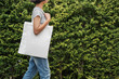 © lovelyday12 - hipster woman with white cotton bag at park