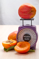 Wall Mural - Kitchen scales and apricots