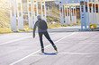 © serhio777 - young man is roller skating in a city park on a warm sunny day