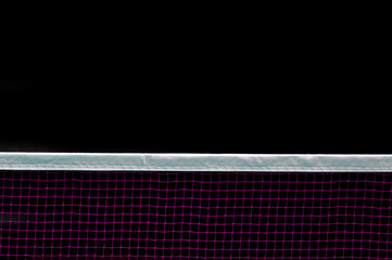 Badminton net indoor on badminton court, closeup view of badminton net with black background