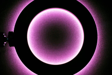 Wall Mural - ultraviolet lamp lights neon fabric and leather textures