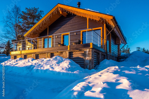 Wooden Cottage With Veranda In Winter Day Winter Villa In The