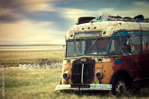 Fotomural Brightly colored vintage hippy van parked in the countryside