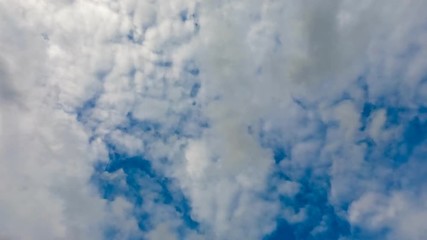 Wall Mural - Time lapse (30 second interval) Very fast moving clouds in the sky