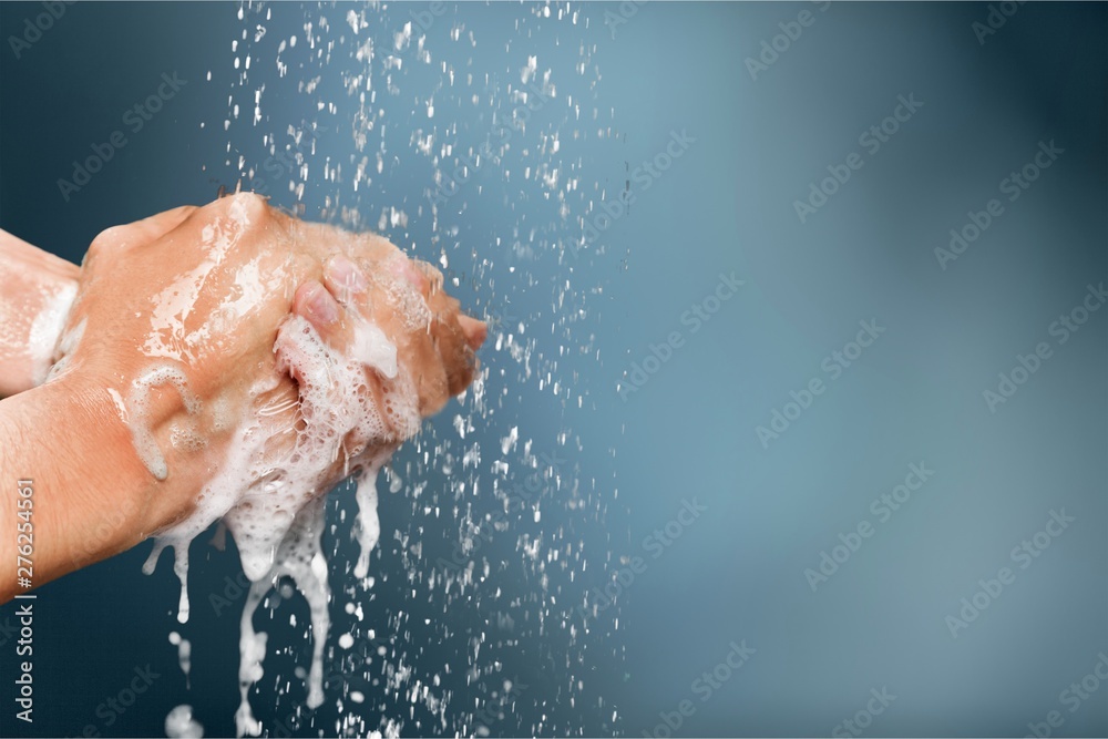 Man washing hands in clean water on blue background - obrazy, fototapety, plakaty 