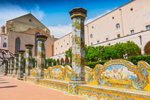Sunny Cloister Of The Clarisses Decorated With Majolica Tiles From Santa Chiara Monastery In Naples, Italy.