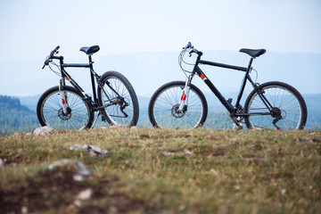 Two bicycles on mountain