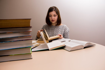 Wall Mural - student girl with stack of books