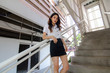 © tiniroma - Portrait of thai adult student university uniform beautiful girl relax and smile