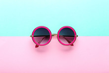 Modern Sunglasses On Colorful Background