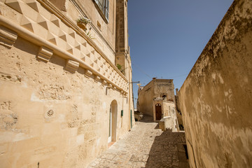 Narrow street of the ancient town of Matera at Basilicata region in southern Italy