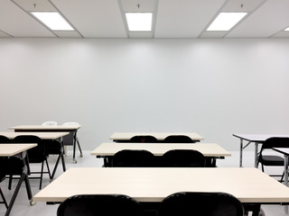 Empty clean room with chairs and tables for training,meeting 