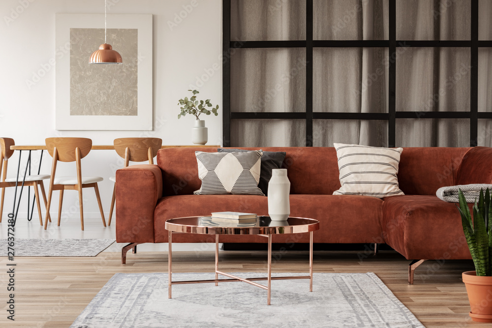 Obraz Stylish Brown Corner Sofa With Patterned Pillows In Elegant Corner Sofa With Patterned Pillows