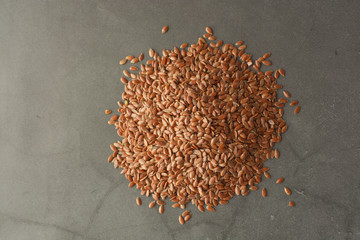 Wall Mural - Linen. Flax seeds. Dark background. Healthy food concept.