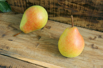 fresh pears on wooden table