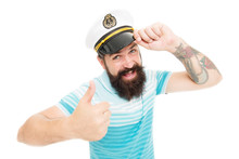 Brutal Seaman Isolated On White. Captain Concept. Welcome Aboard. Bearded Man Captain Of Ship. Sea Cruise. Travel Concept. Summer Vacation. Hipster Beard Mustache Sailor Hat. Captain Of Cruise Liner