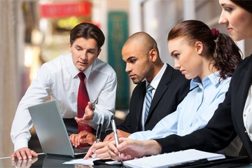 Wall Mural - Successful business team  isolated on white background