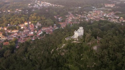 Wall Mural - Sintra Pena palace in Portugal, 4k aerial drone sunset evening