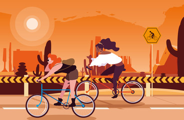 Sticker - women riding bike in desert landscape with signage for cyclist