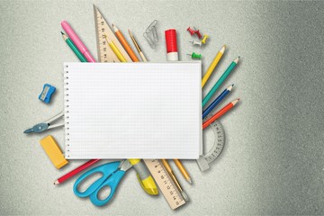 Poster - Colorful school supplies on wooden table background