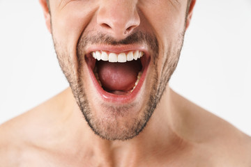 Cropped photo closeup of excited naked man screaming at camera with emotional face