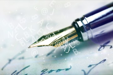 Wall Mural - Close-up of Vintage Fountain pen on paper for business background