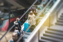 People On Escalator In Train Station, Travel Concept Motion Blur