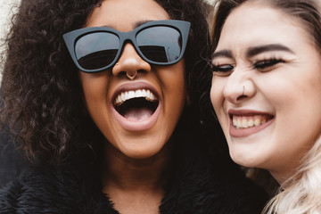 Two female friends exploring the city