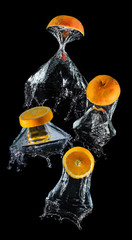 Wall Mural - Water droping slice orange fruits.