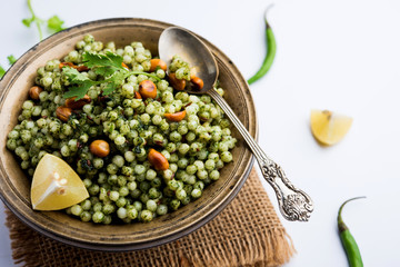 Hariyali sabudana khichdi is a delicious twist to the regular Sago khichadi made using cilantro , chillies and groundnuts