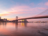 Fototapeta Most - Wide Angle View of the Williamsburg Bridge During Sunrise With Clear Skies