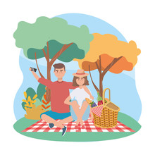 Woman And Man With Smartphone Selfie And Food In The Hamper