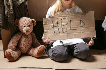 Homeless little girl begging for help