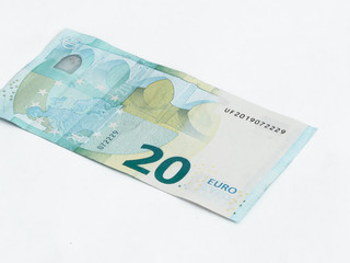 One  banknote worth 20 Euro isolated on a white background