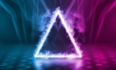 Empty background scene. Dark reflection of the street on the wet asphalt. Rays of neon light in the dark, neon figure of a triangle, smoke. Background of empty stage show. Abstract dark background.