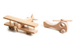 Retro wooden airplane and helicopter toy on white background.