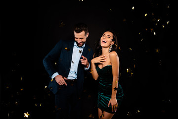 Poster - Portrait of his he her she nice-looking classy attractive glamorous smart cheerful excited ecstatic two person flying decorative element having fun amusement entertainment isolated on black background